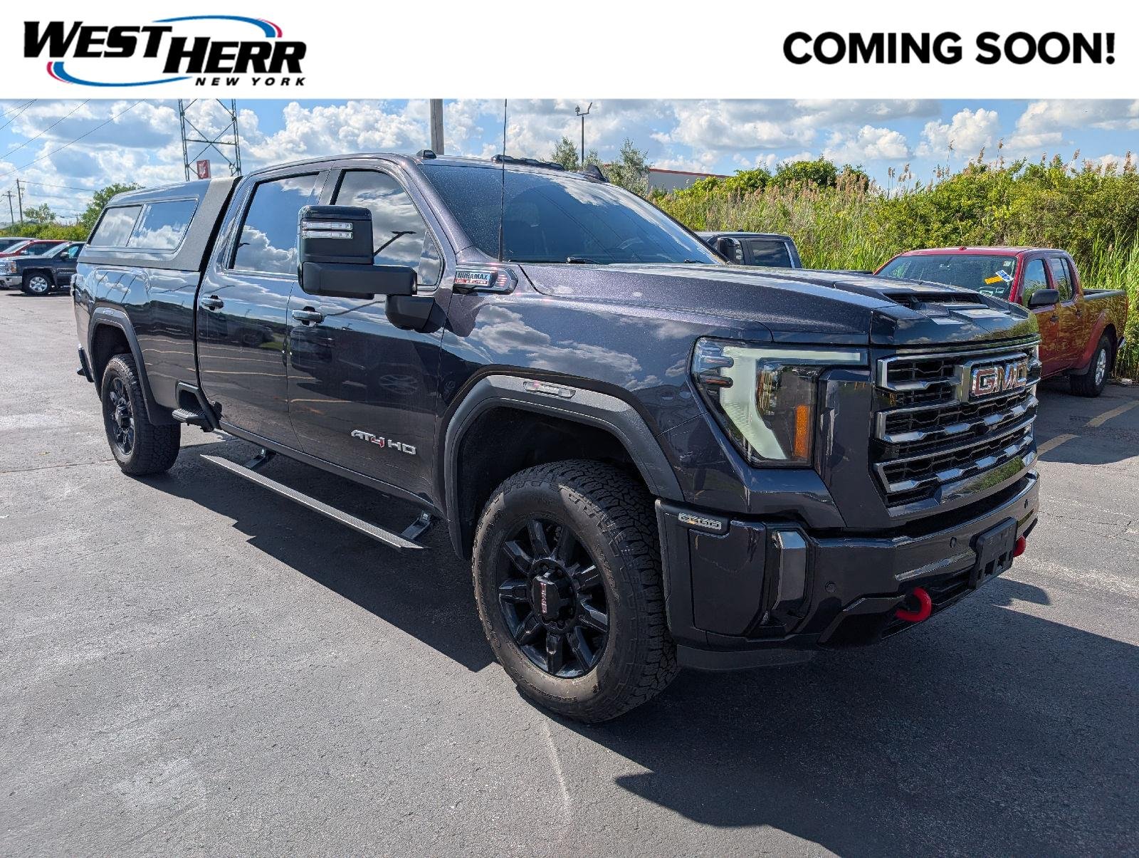 Used 2024 Titanium Rush Metallic GMC AT4 image 1