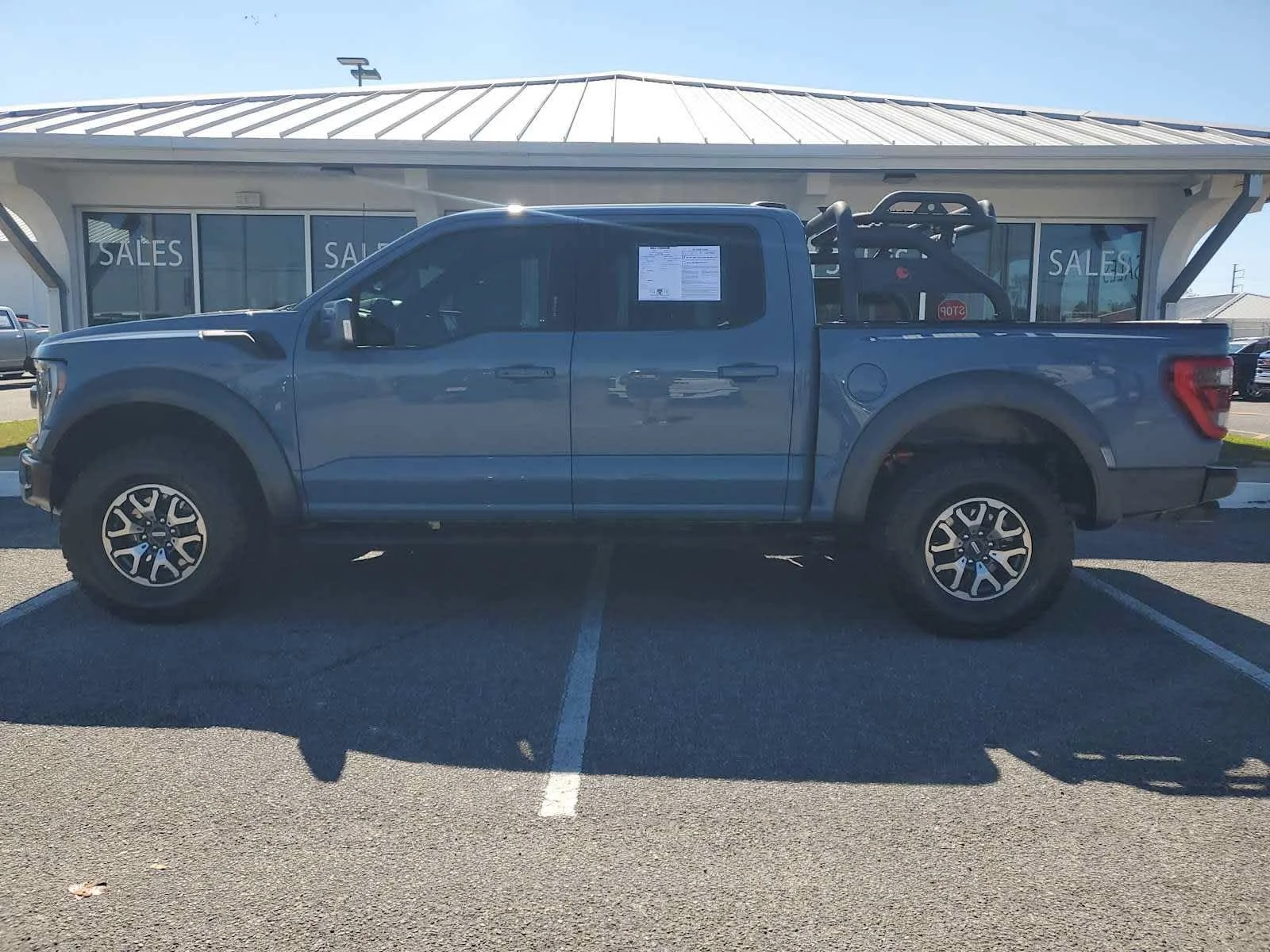 Used 2023 Antimatter Blue Metallic Ford Raptor image 2