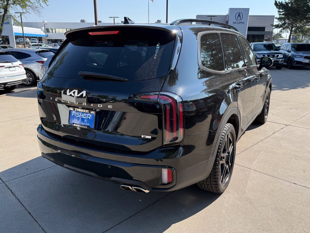 Used 2024 Ebony Black Kia EX X-Line image 4