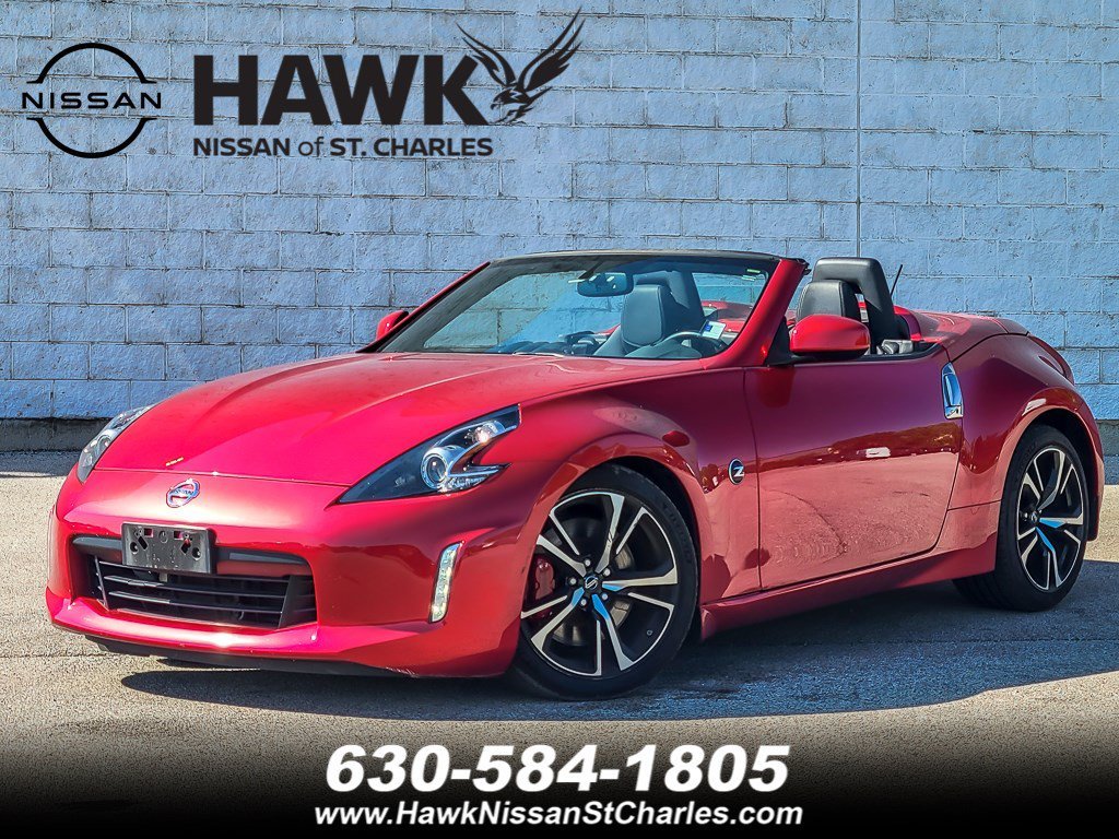 Used 2018 Passion Red Nissan Touring Sport image 1