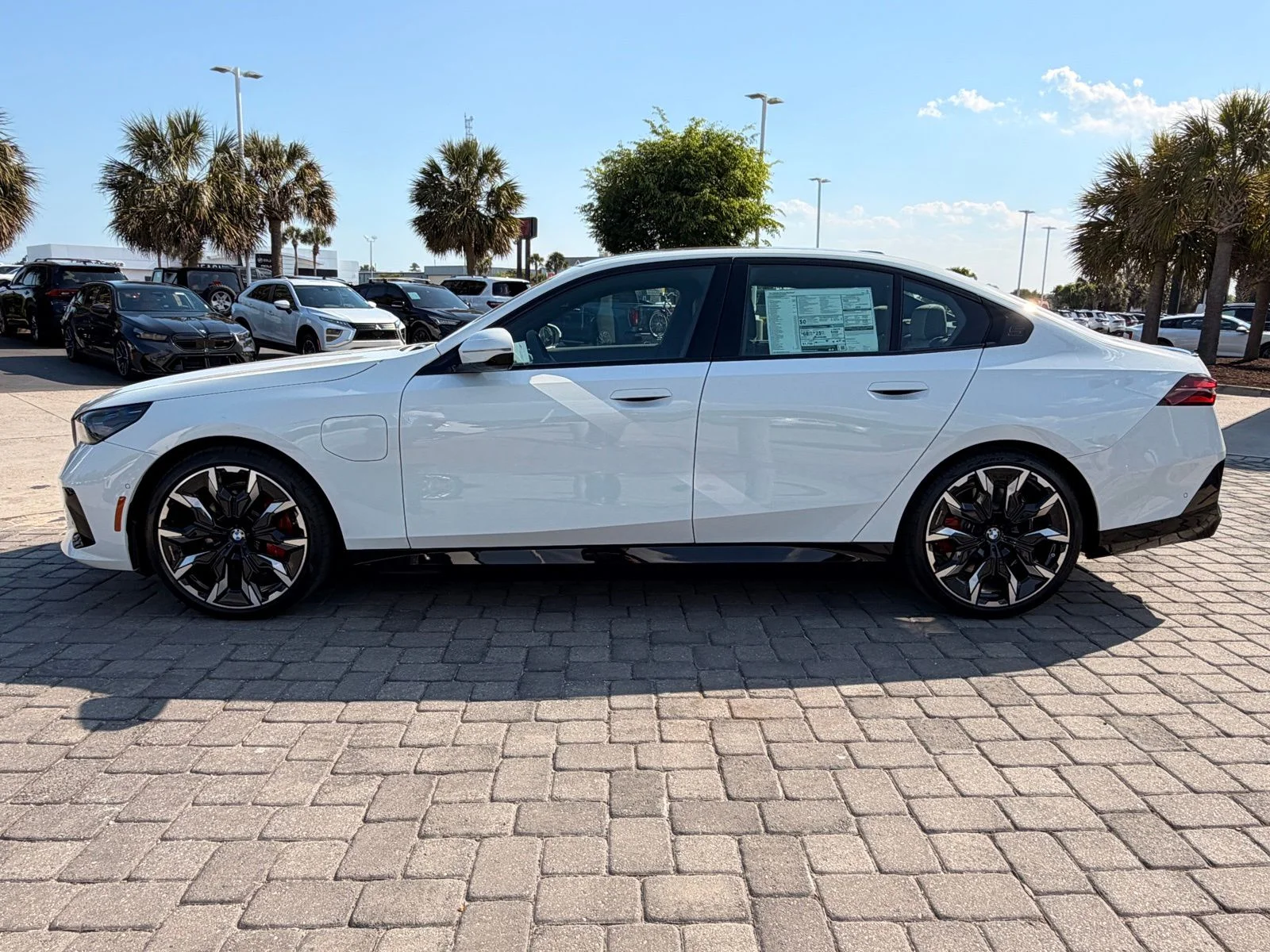 2026 BMW 5 Series 550e - Photo 12