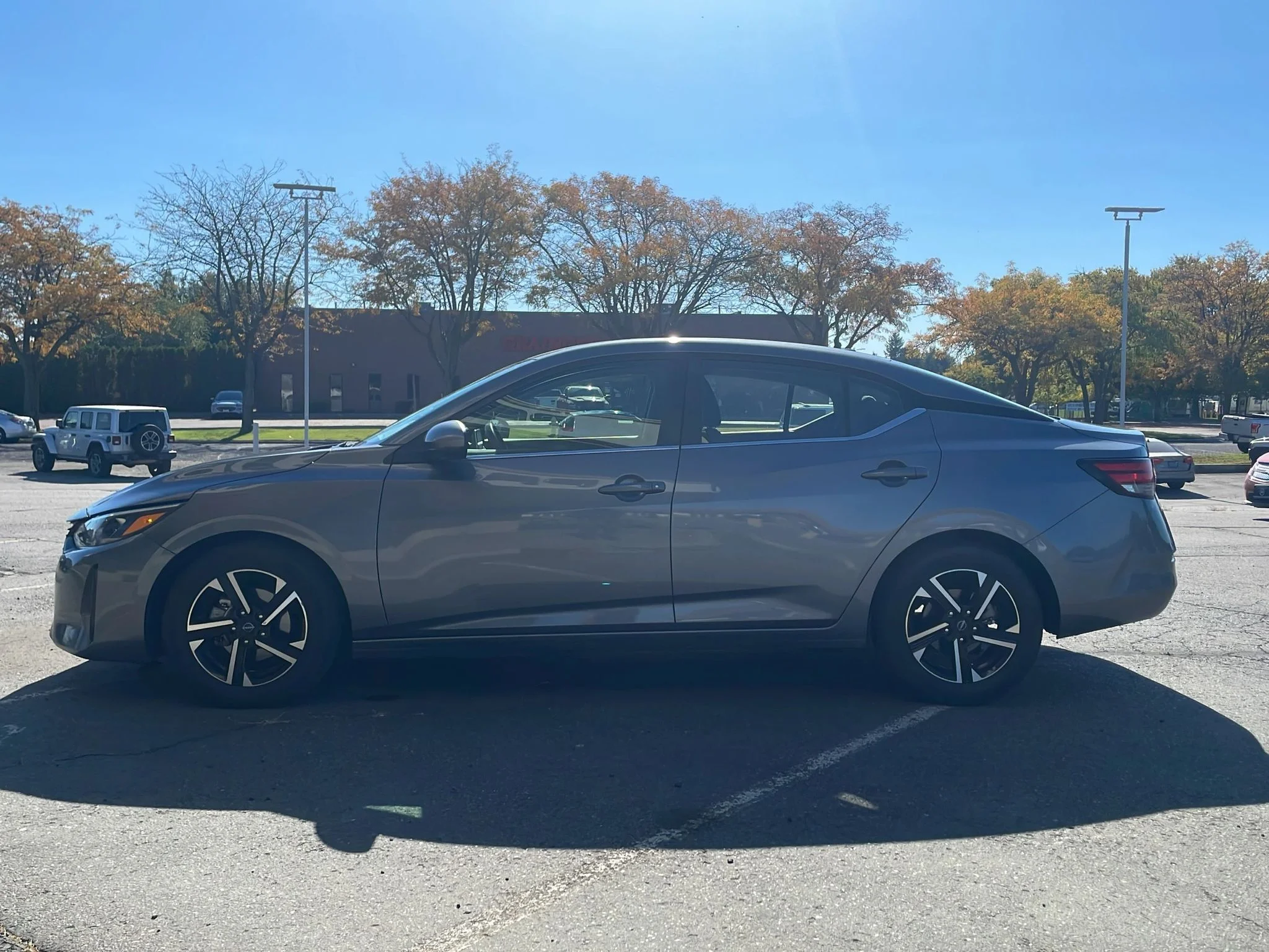 Used 2024 Gun Metallic Nissan SV image 4