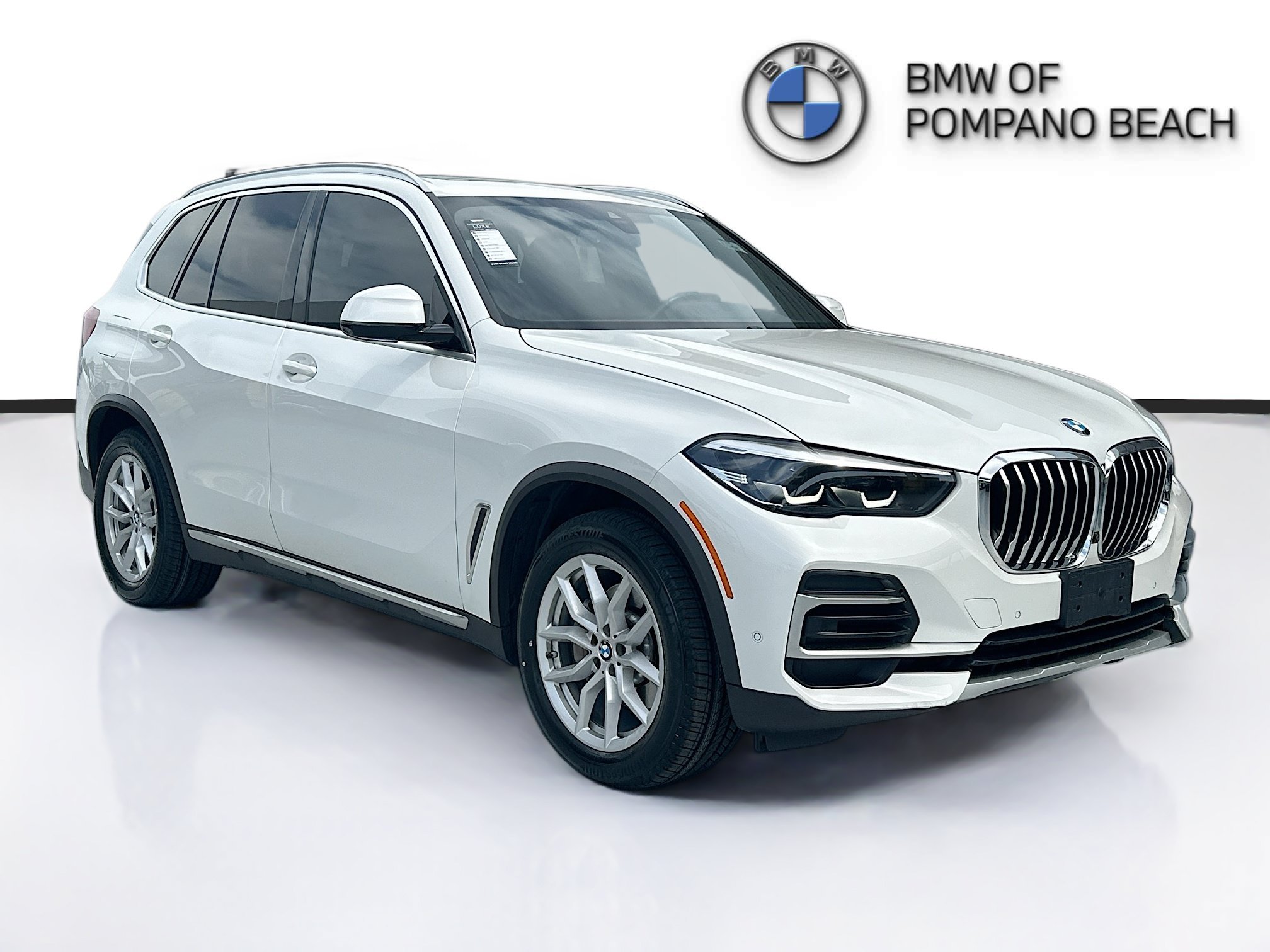 Certified Used 2023 Mineral White Metallic BMW xDrive40i image 1