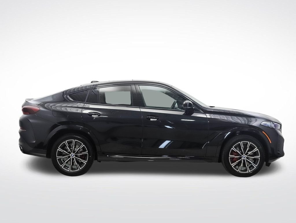 Used 2026 Black Sapphire Metallic BMW M60i image 6