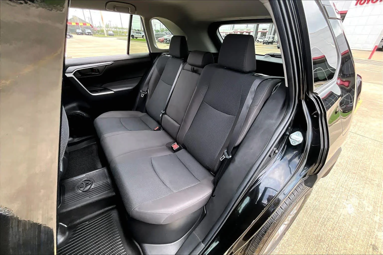 Used 2024 Midnight Black Metallic Toyota Hybrid LE image 19