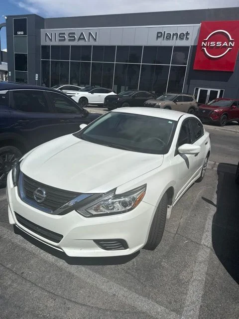 Used 2017 Pearl White Nissan 2.5 S image 1