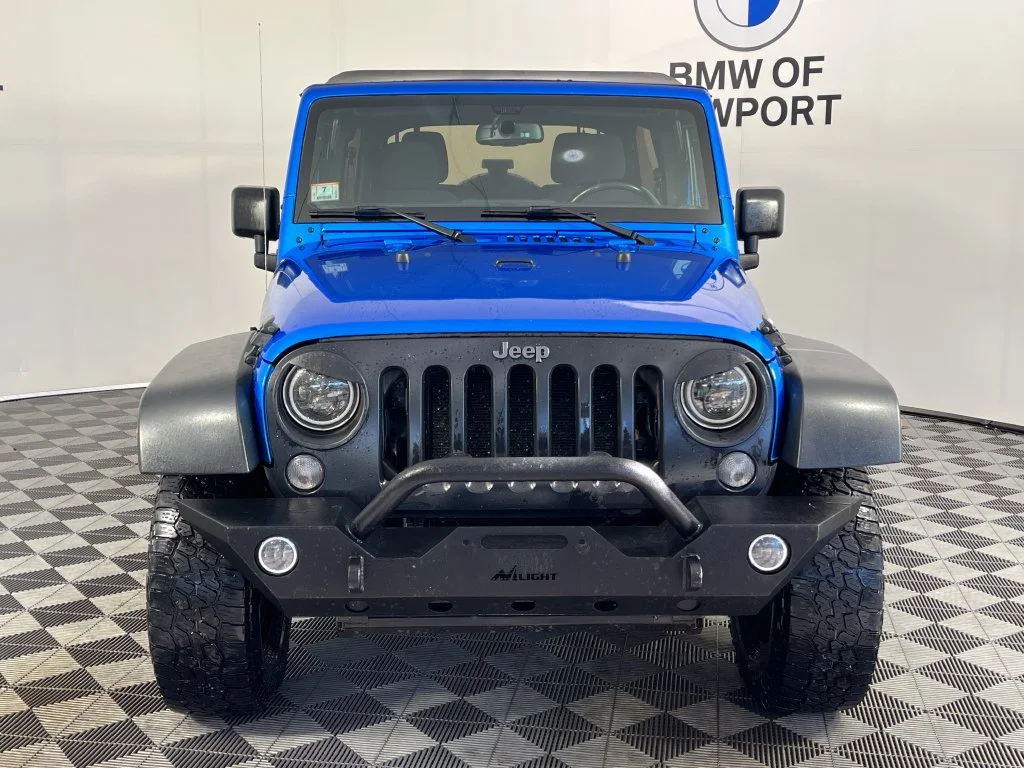 Used 2016 Blue Pearl Jeep Unlimited Sport image 5