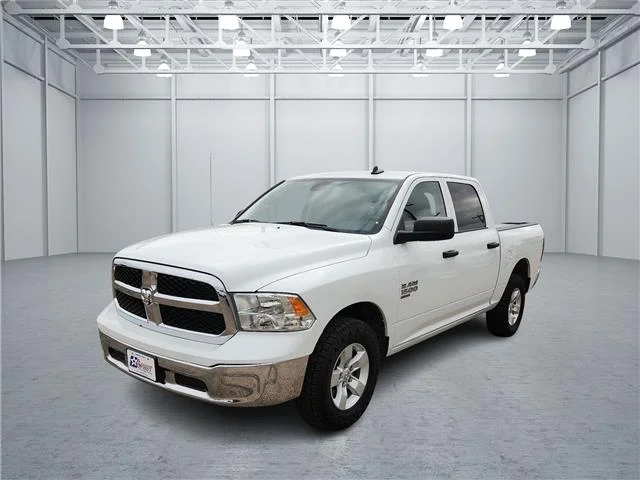 Used 2023 White RAM SLT 4x4 Crew Cab 5.6 ft. box 140 in. WB image 1