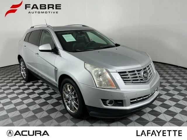 Used 2014 Radiant Silver Metallic Cadillac Performance image 1