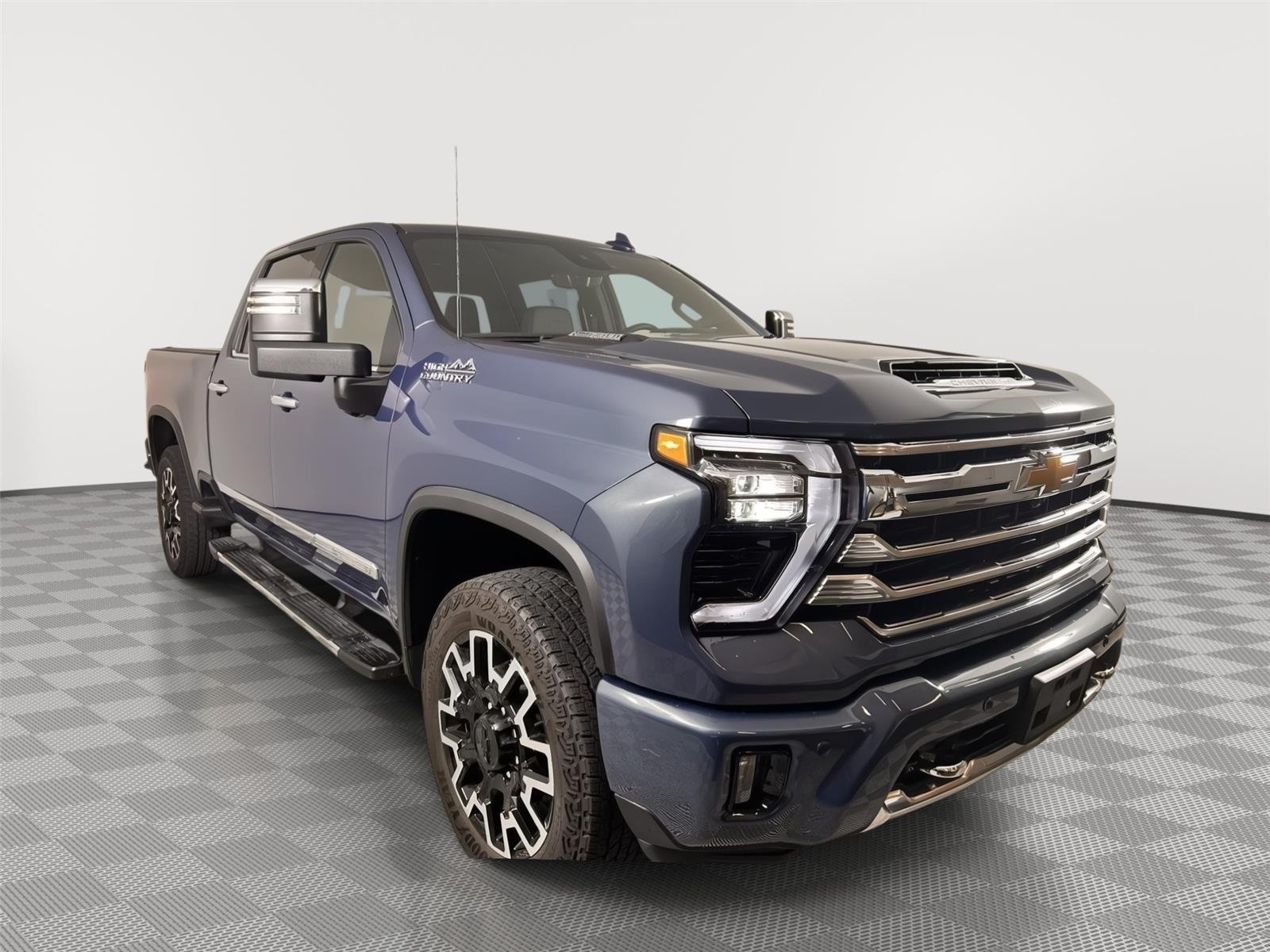 Used 2024 Lakeshore Blue Metallic Chevrolet High Country image 1