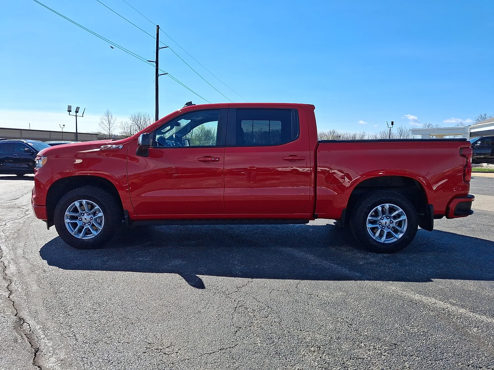 Used 2023 Red Hot - G7C Chevrolet 4WD Crew Cab Short Bed RST image 5