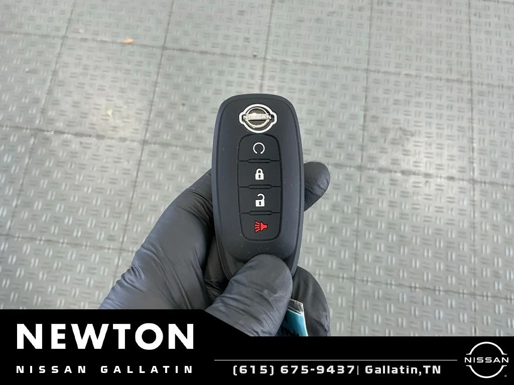 Used 2023 Electric Blue Metallic/Super Black Nissan SV image 30