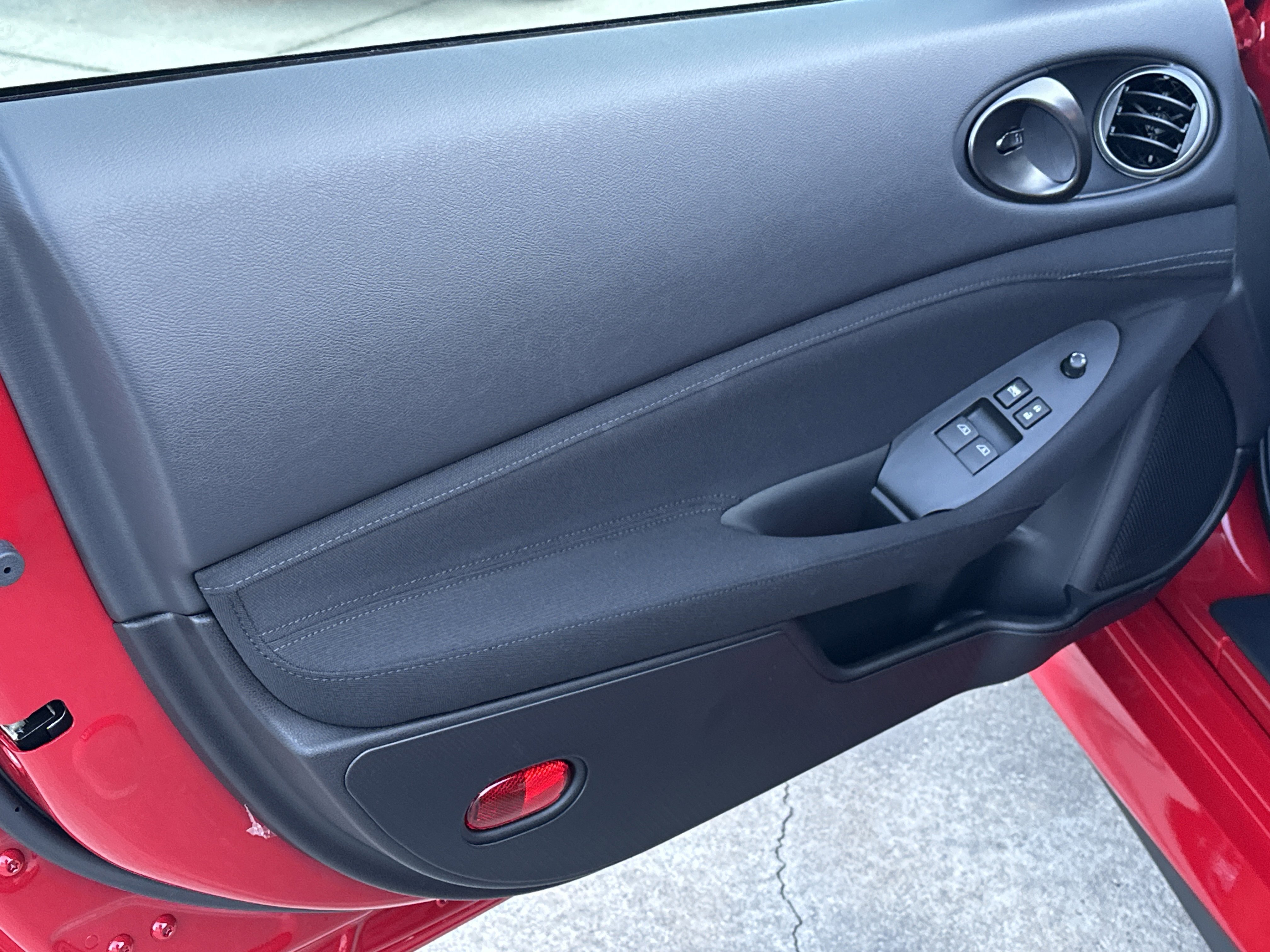 New 2026 Solid Red/Super Black Nissan Sport image 11