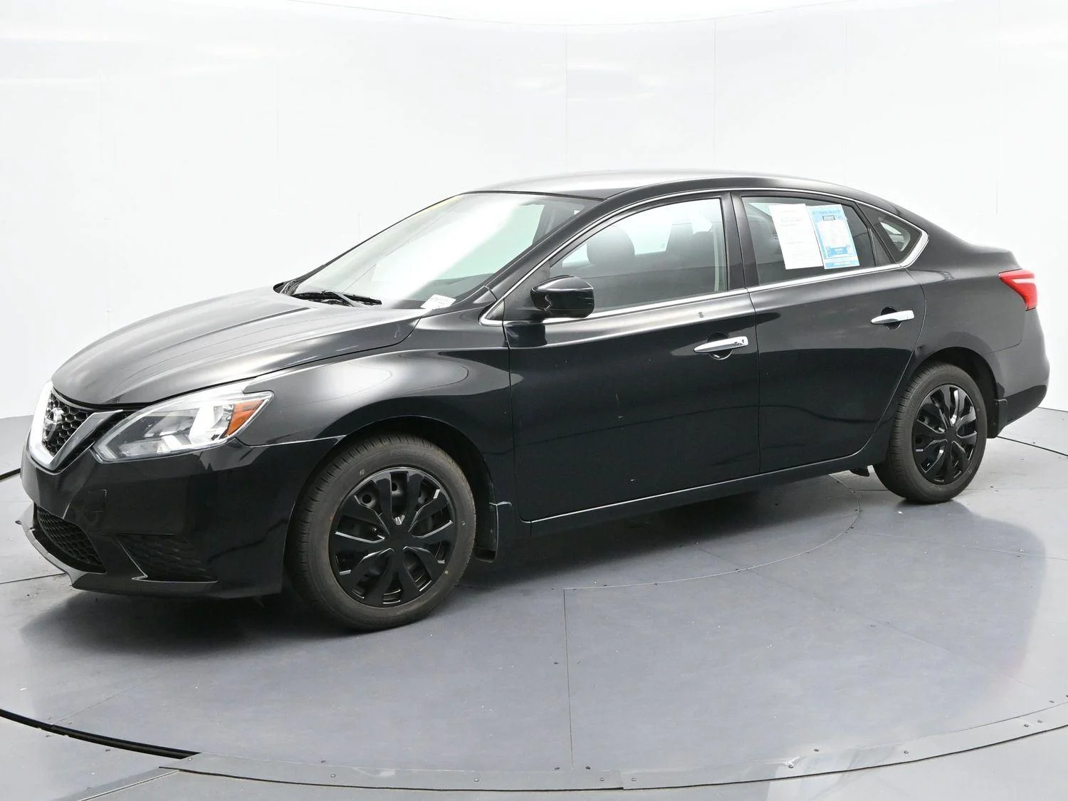 Used 2017 Super Black Nissan SV image 3