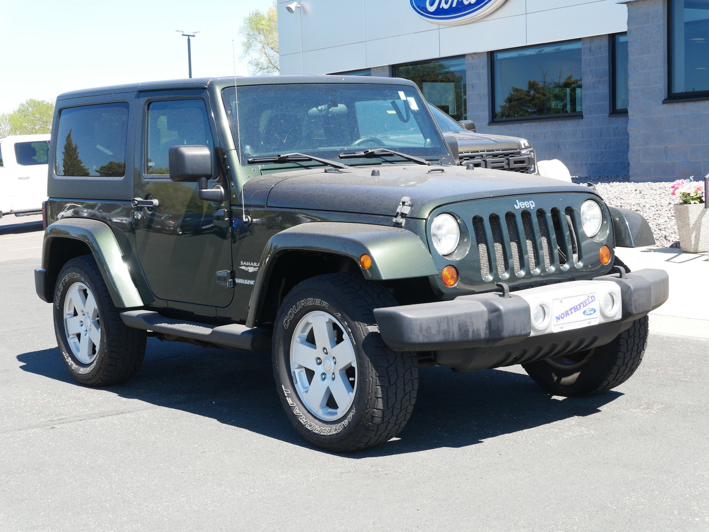 Used 2011 Jeep Wrangler Sahara with VIN 1J4GA5D1XBL636514 for sale in Northfield, Minnesota