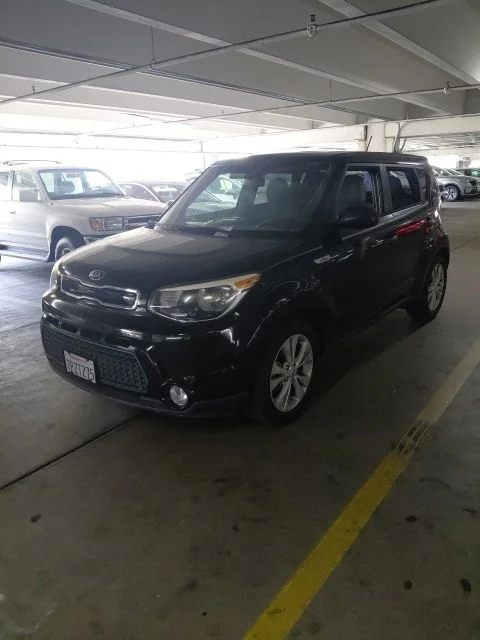 Used 2016 Black Kia Plus image 2