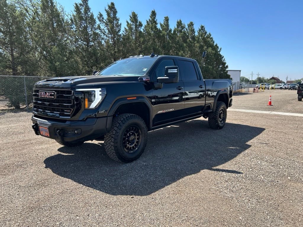 Used 2024 Onyx Black GMC AT4X image 1