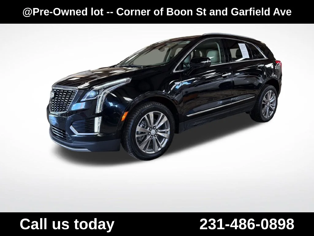 Used 2022 Black Cadillac Premium Luxury image 1