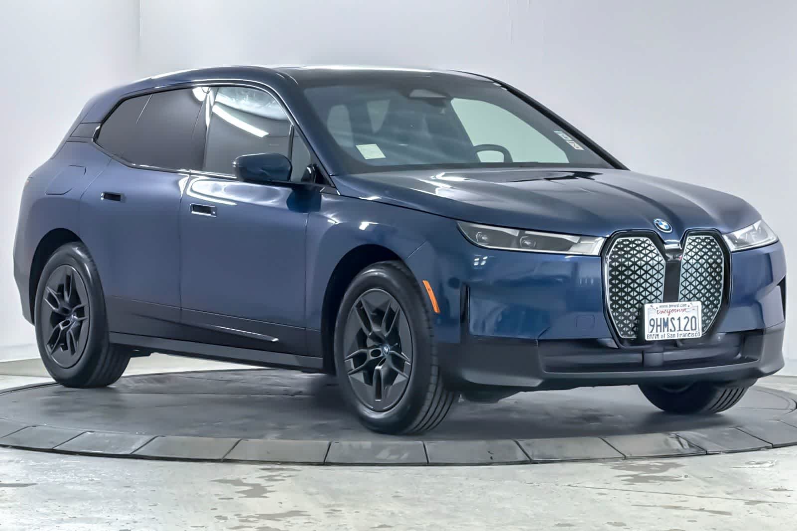 Used 2024 Phytonic Blue Metallic BMW xDrive50 image 9