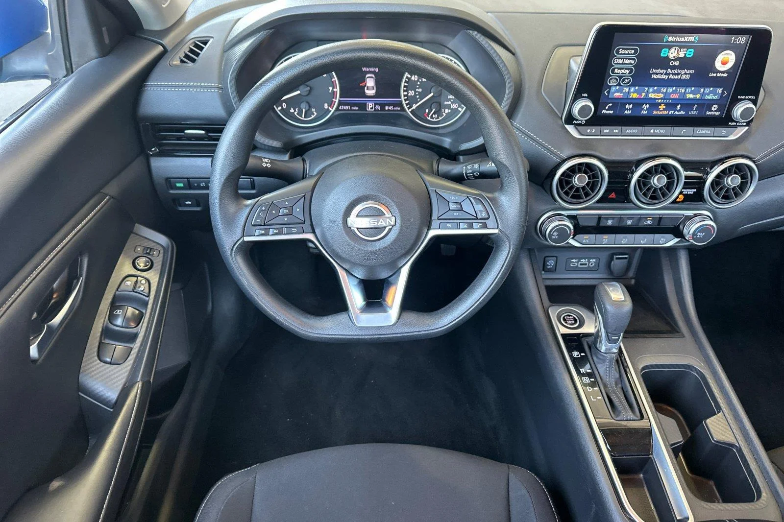 Used 2025 Electric Blue Metallic Nissan SV image 14