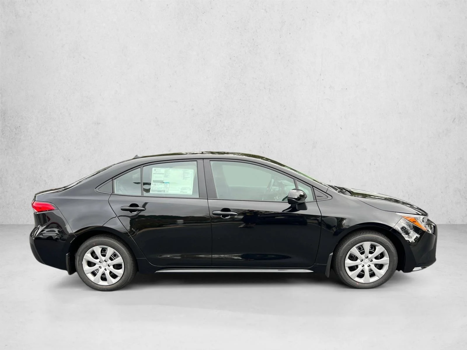 New 2026 Midnight Black Metallic Toyota LE image 2