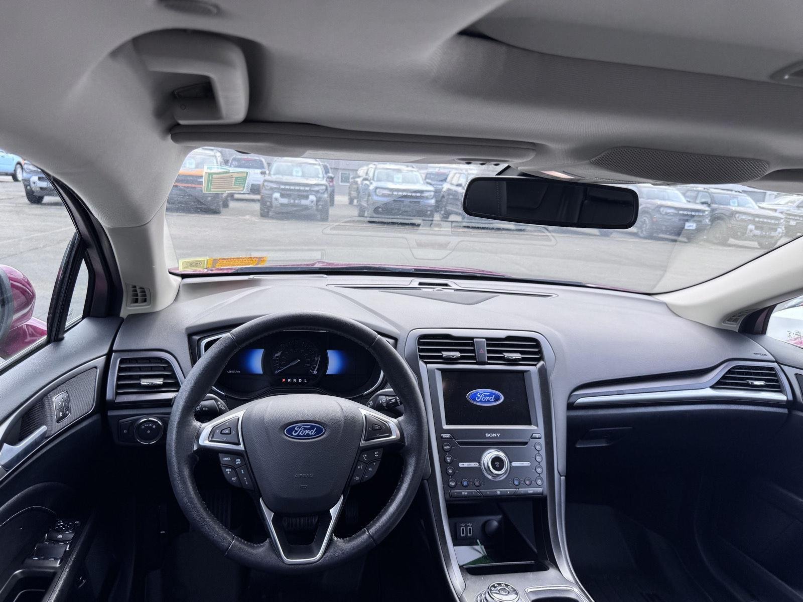 Used 2019 Ruby Red Metallic Tinted Clearcoat Ford Titanium image 8