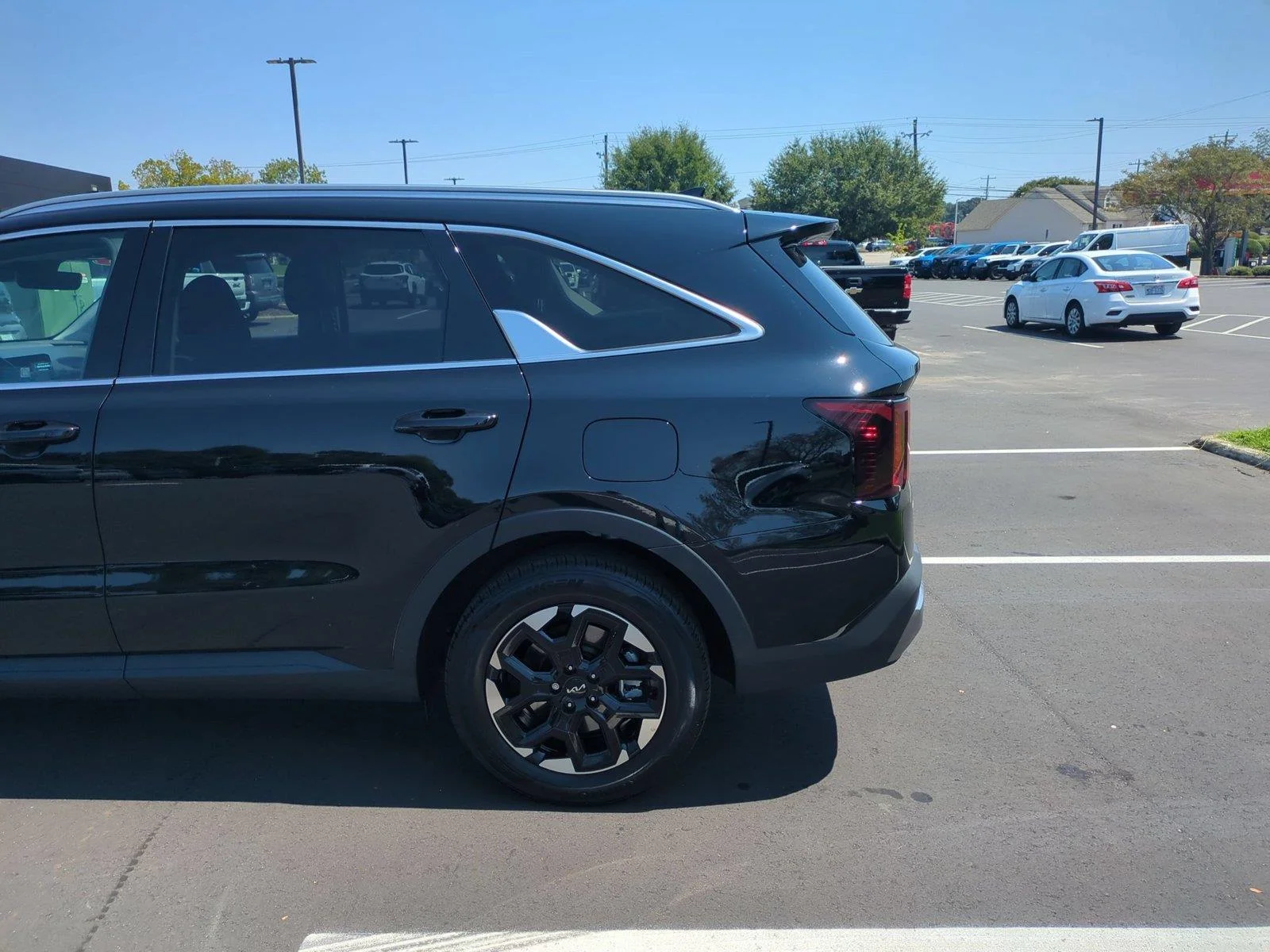 Used 2025 Ebony Black Kia S image 11