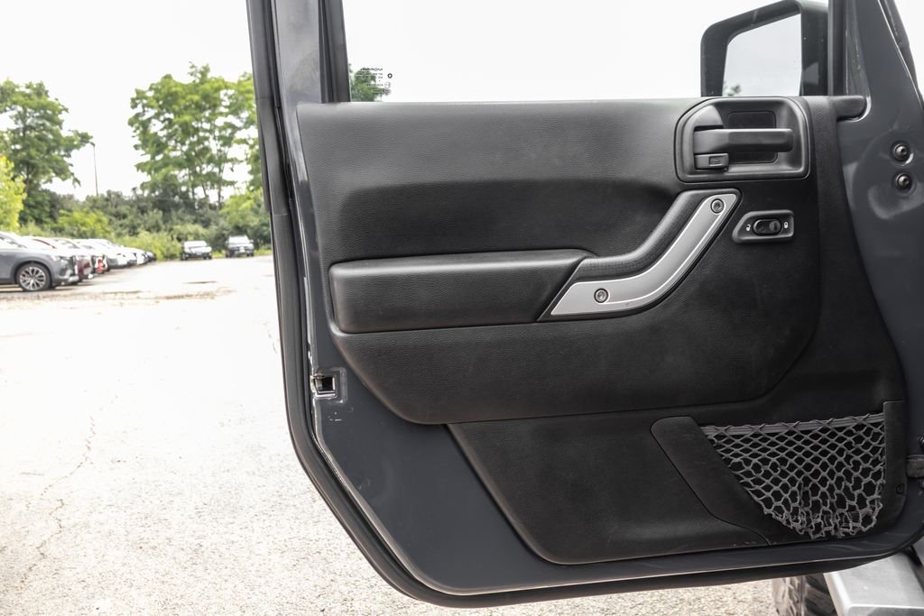 Used 2017 Black Jeep Unlimited Sahara image 26