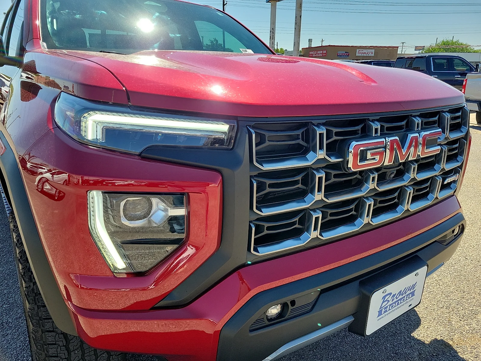 Certified Used 2024 Volcanic Red GMC 4WD AT4 image 13
