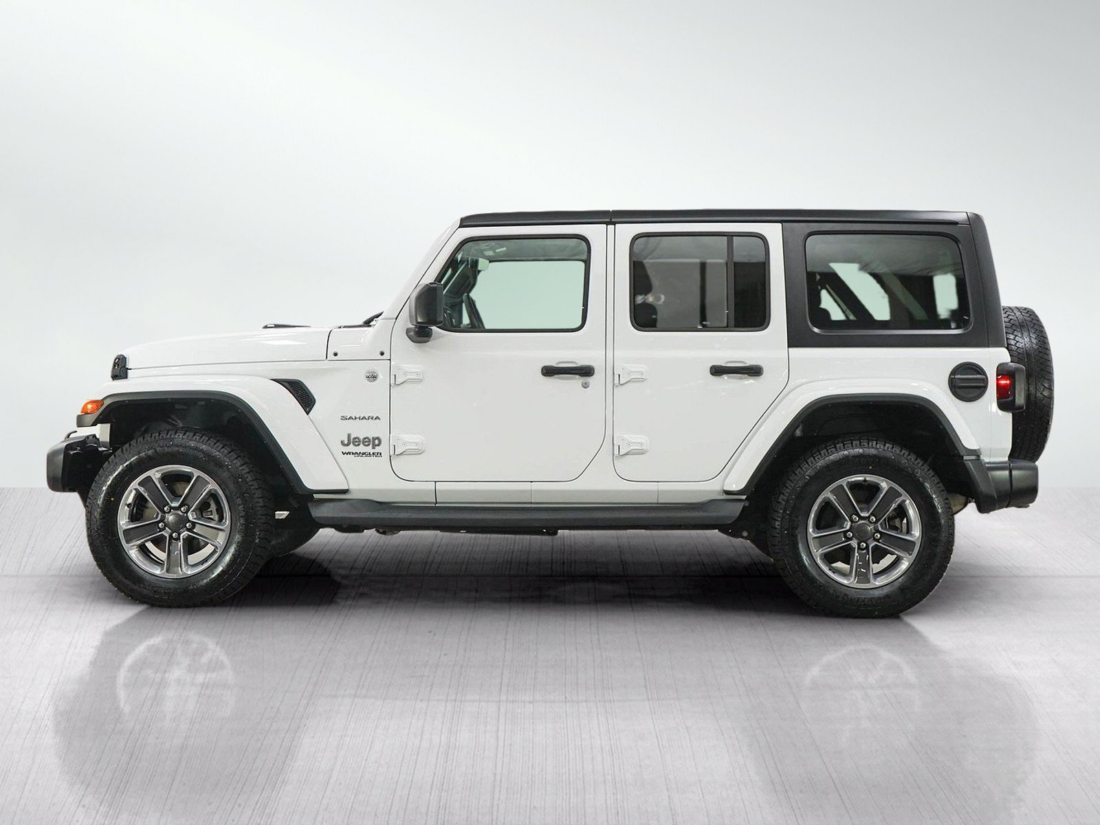 Used 2019 Jeep Wrangler Unlimited Sahara with VIN 1C4HJXEG3KW632781 for sale in Minneapolis, Minnesota