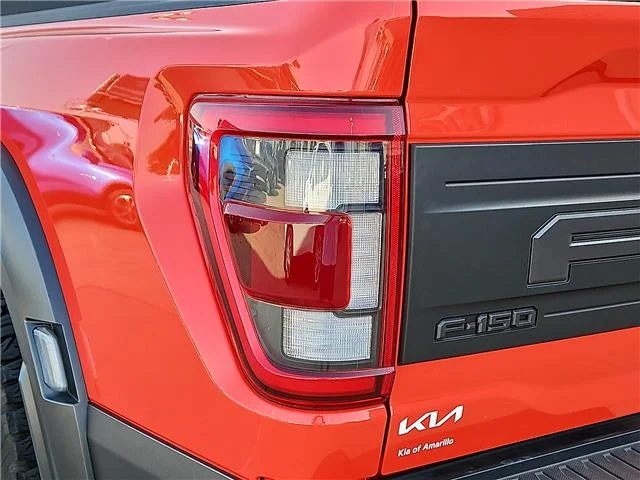 Used 2023 Orange Ford Raptor 4x4 SuperCrew Cab 5.5 ft. box 145 in. WB image 7