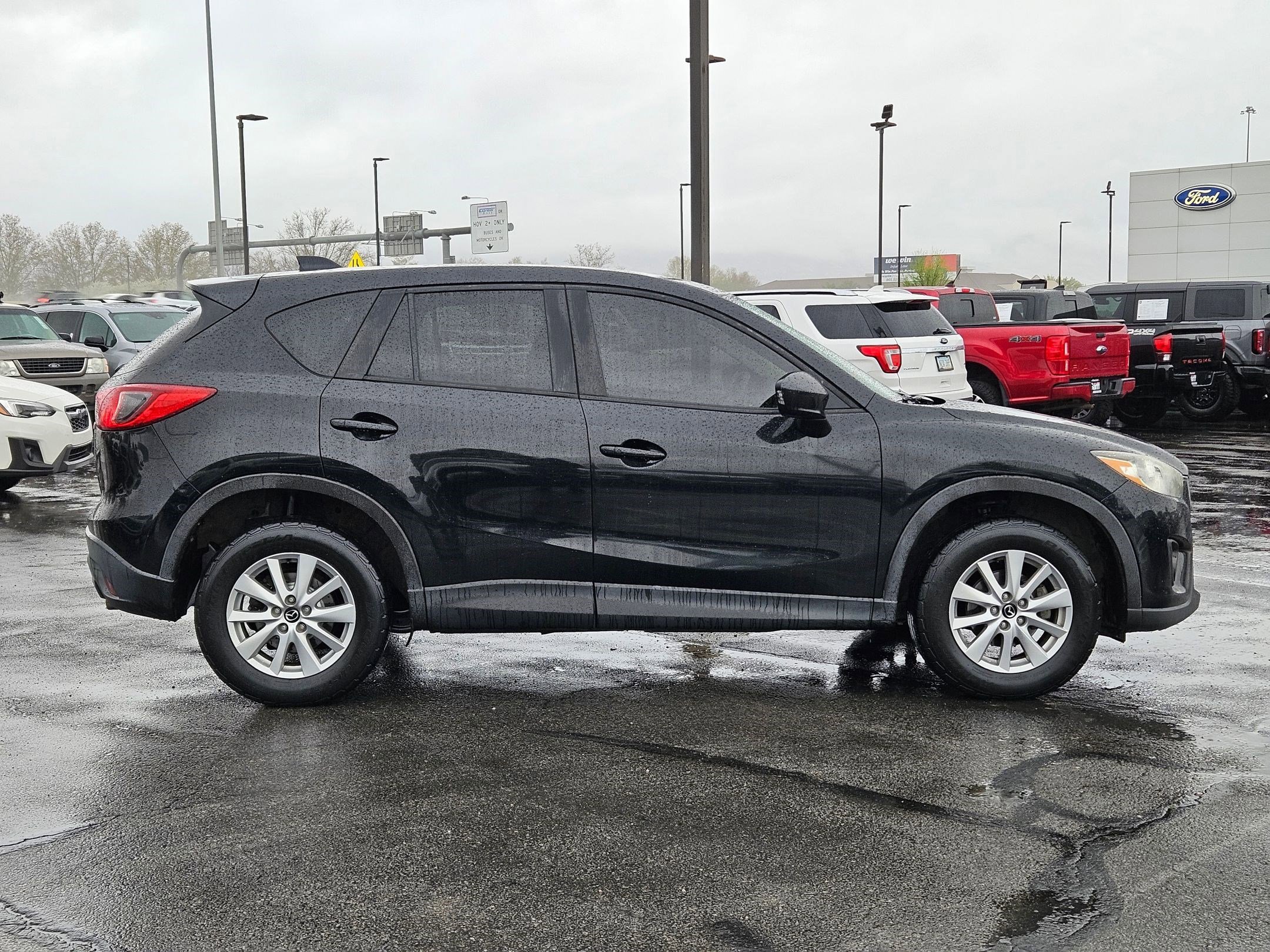 Used 2015 Mazda CX-5 Touring with VIN JM3KE4CY9F0435392 for sale in American Fork, UT