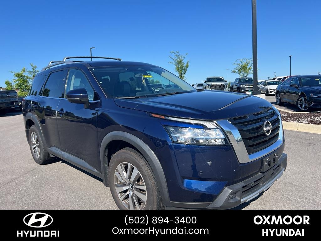 Used 2023 Deep Ocean Blue Pearl Nissan SL image 1