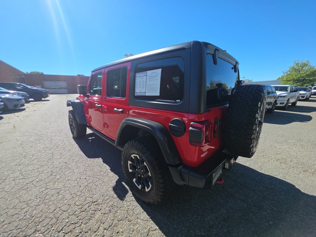 Used 2026 Firecracker Red Clearcoat Jeep Rubicon image 12