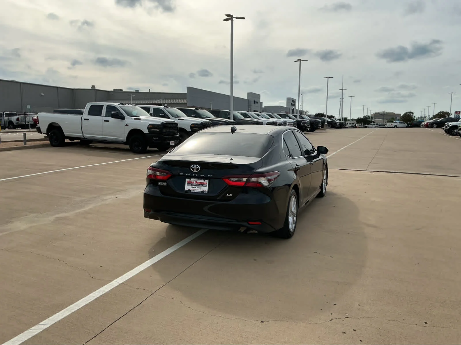Used 2023 Midnight Black Metallic Toyota LE image 6