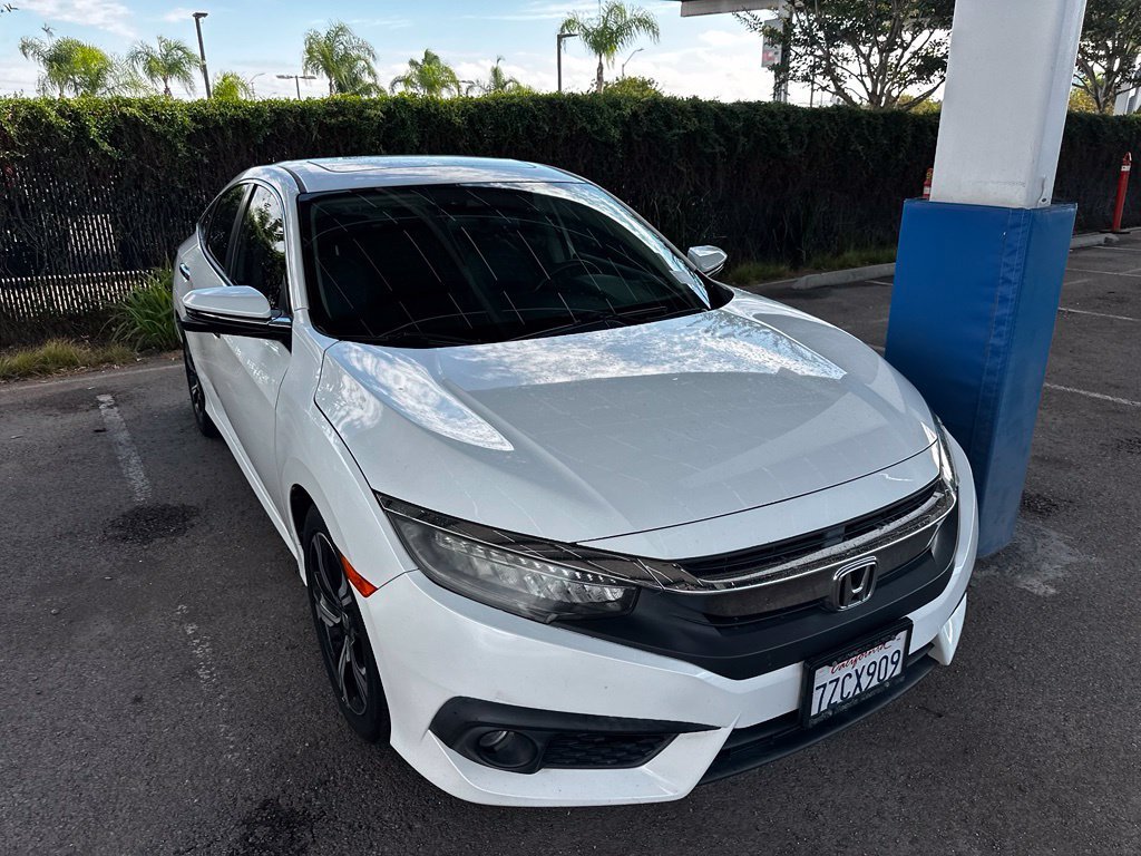 Used 2017 White Orchid Pearl Honda Touring image 6