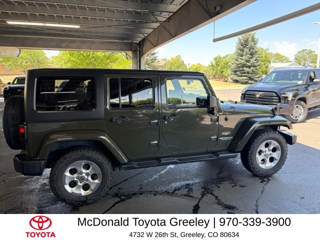 Used 2015 Green Jeep Unlimited Sahara image 4
