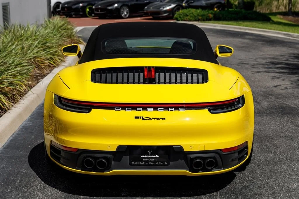 Used 2022 Racing Yellow Porsche Carrera image 4