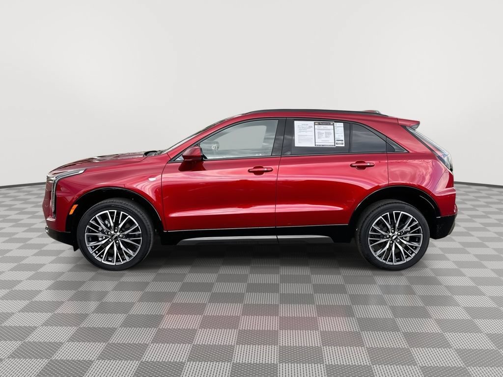 Used 2025 Radiant Red Tintcoat Cadillac Sport image 7