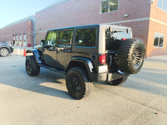 Used 2018 Black Jeep Unlimited Sahara image 4