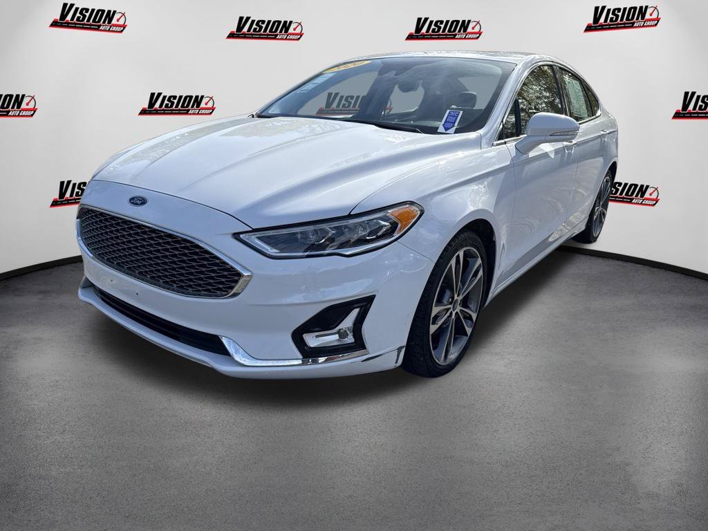 Used 2020 White Ford Titanium image 1