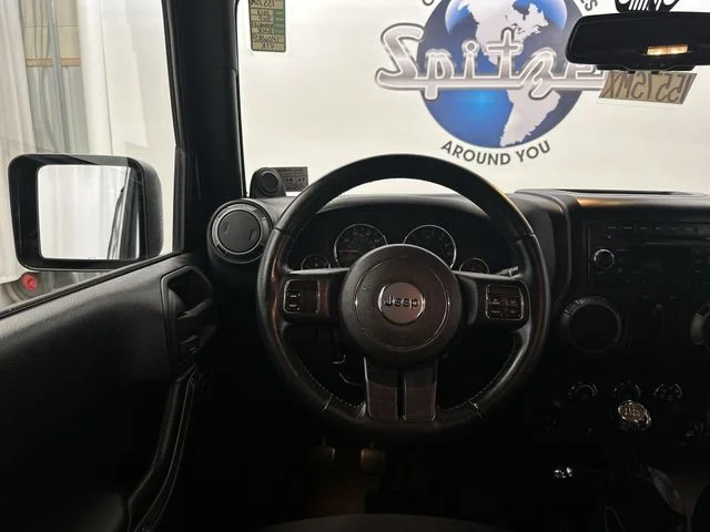 Used 2013 Black Clearcoat Jeep Sport image 14