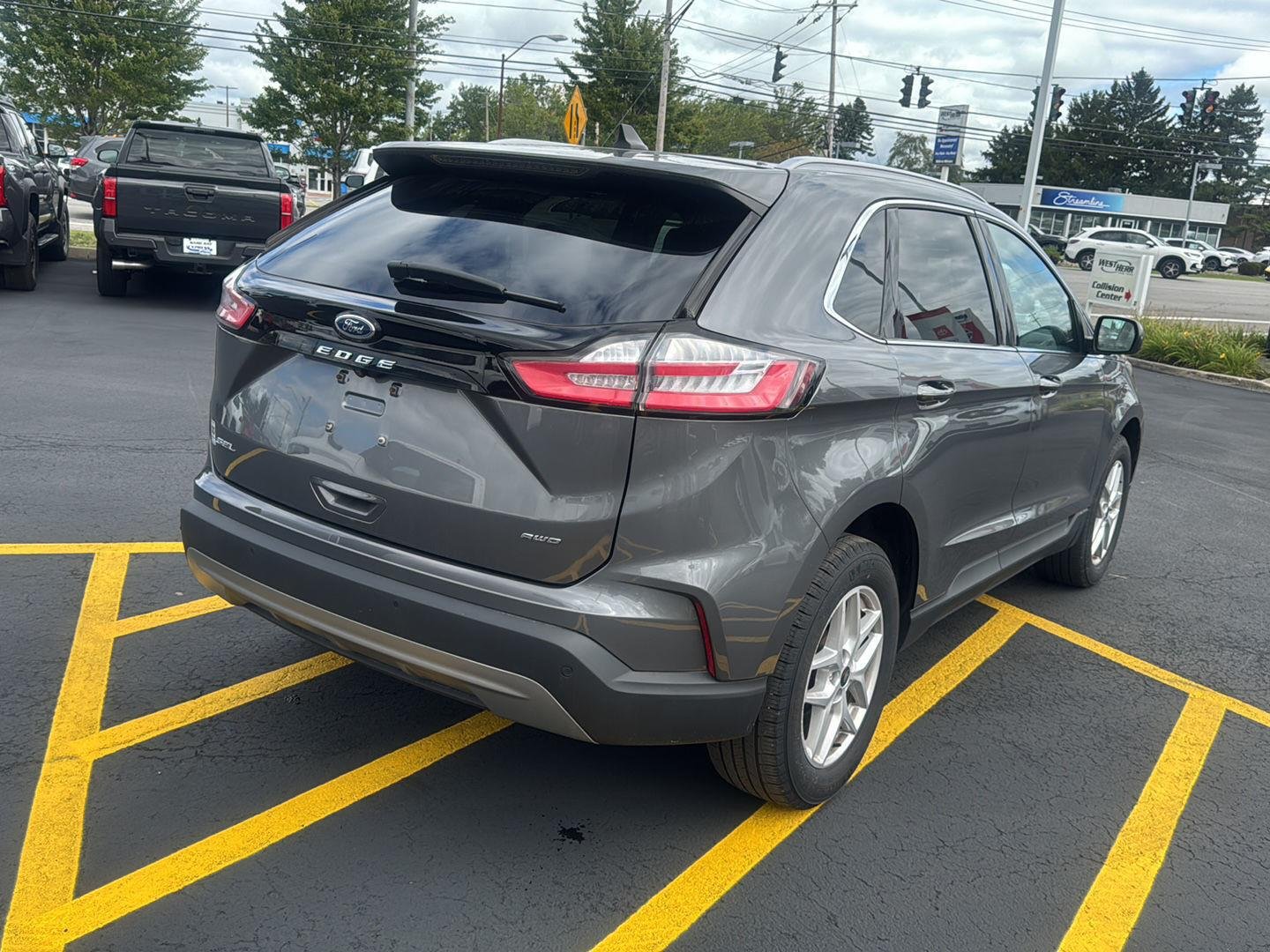 Used 2024 Carbonized Gray Ford SEL image 6