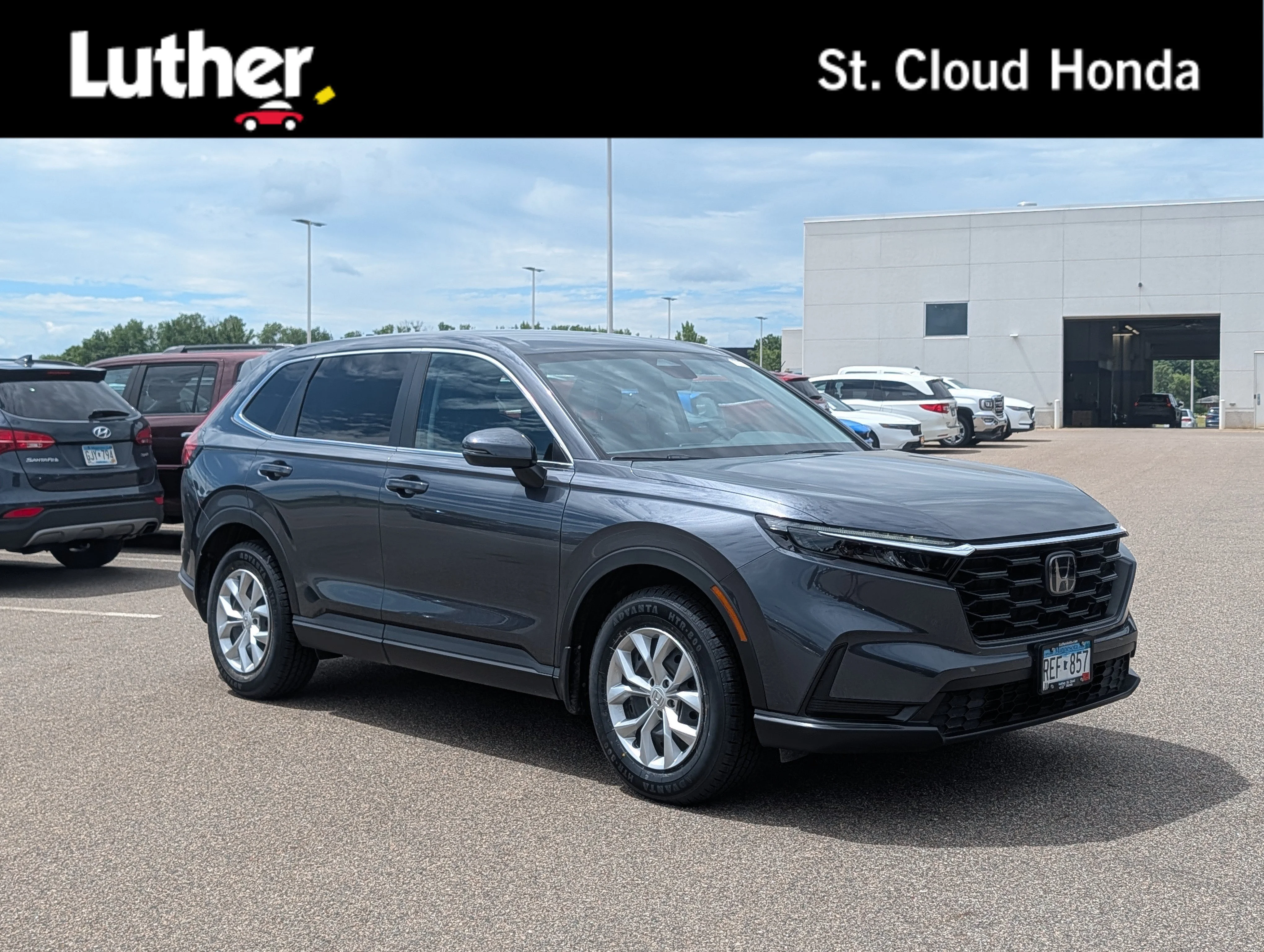 Used 2025 Meteorite Gray Metallic Honda LX image 1