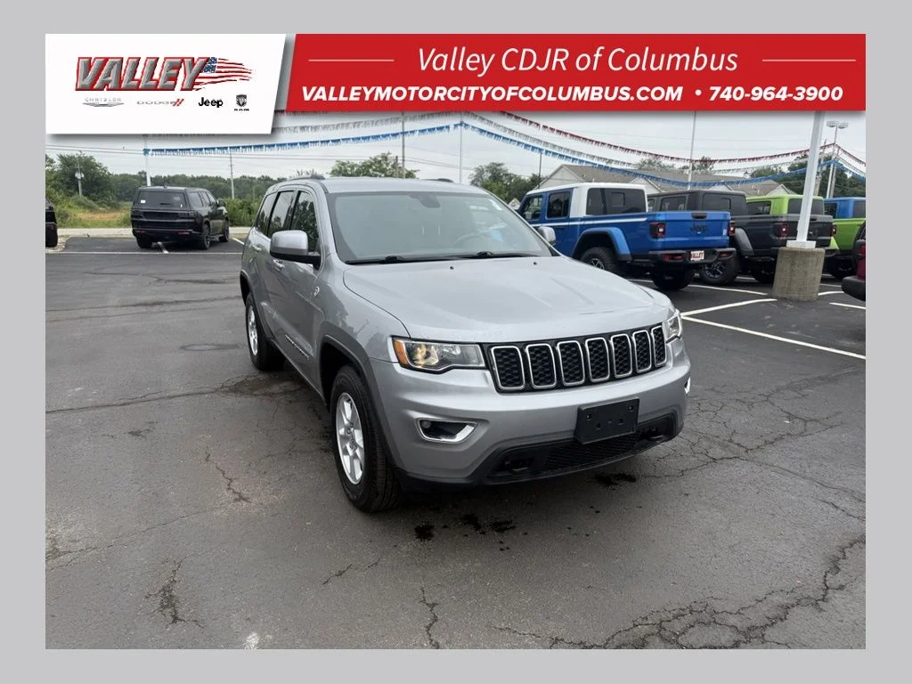 Used 2017 Silver Jeep Laredo image 1