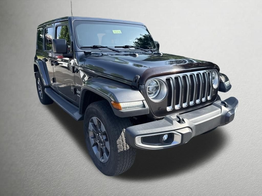 Used 2018 Crystal Metallic Jeep Unlimited Sahara image 1