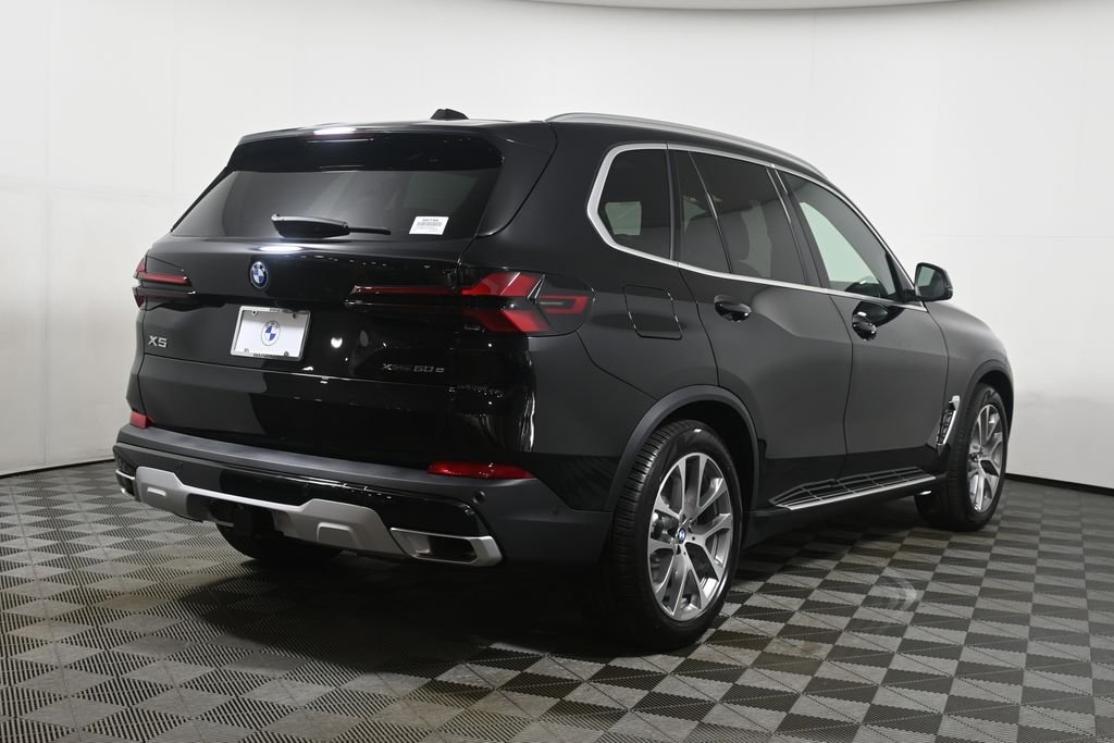New 2026 Black Sapphire Metallic BMW xDrive50e image 7