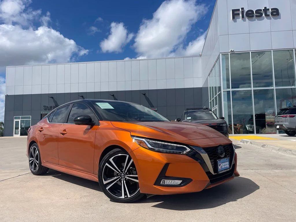 Certified Used 2021 Orange Nissan SR image 1