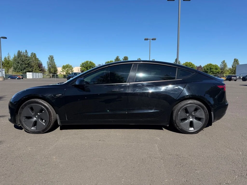 Used 2021 Solid Black Tesla Standard Range Plus image 4