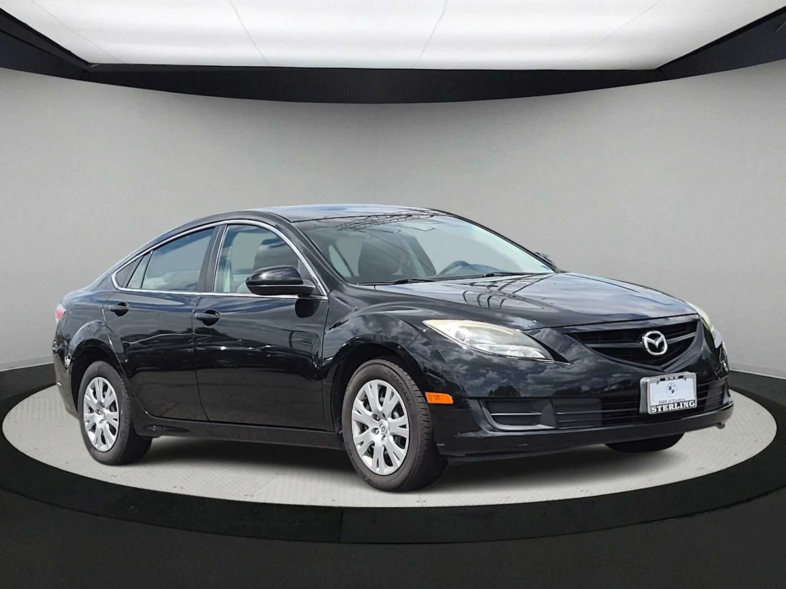 Used 2011 Ebony Black Mazda i Sport image 2